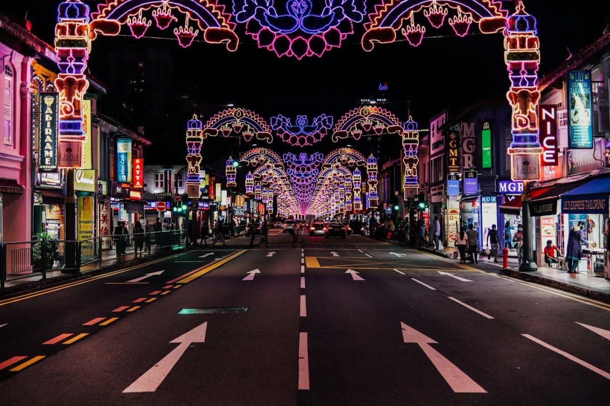 The Deepavali street light-up along Serangoon Road in Little India, Singapore, with lit arches over the road at night