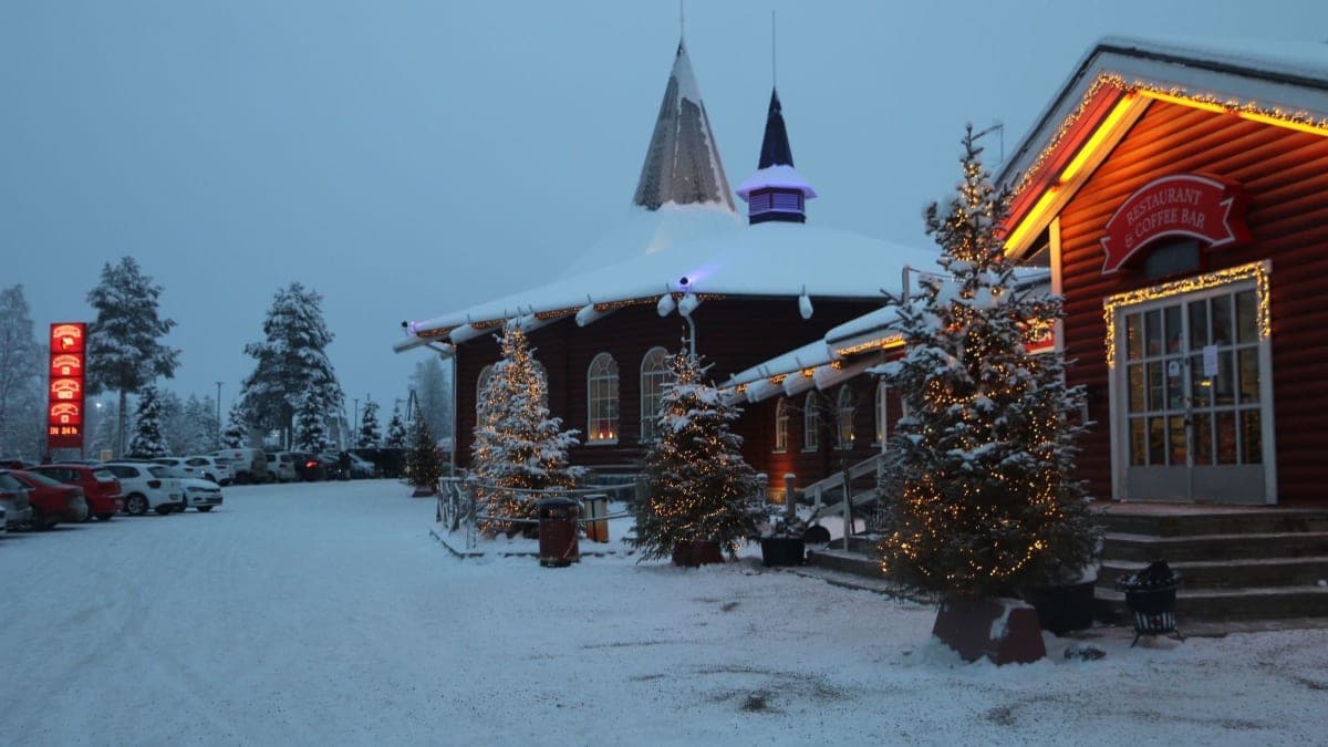 Santa Claus Village in Rovaniemi at twilight in the snow