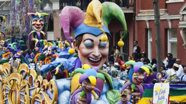 Mardi Gras parade floats and crowds in New Orleans